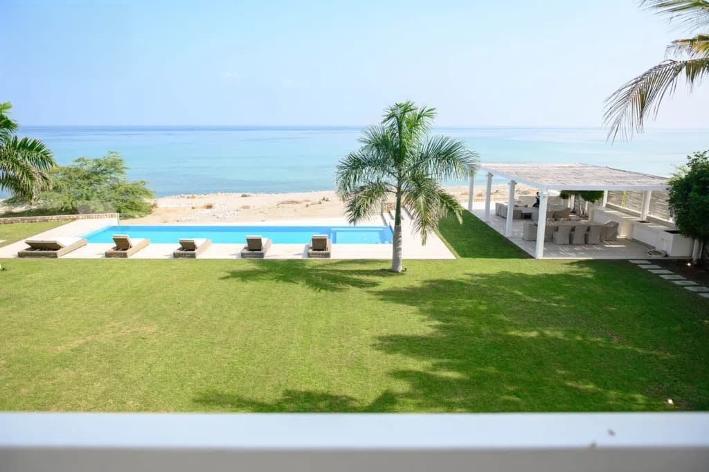 Luxurious 5BR beachfront Villa with private pool and Marina access available for Sale in Jebel Sifah 4